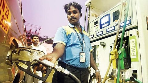 A staffer filling petrol at a fuel station in Chennai | Martin Louis