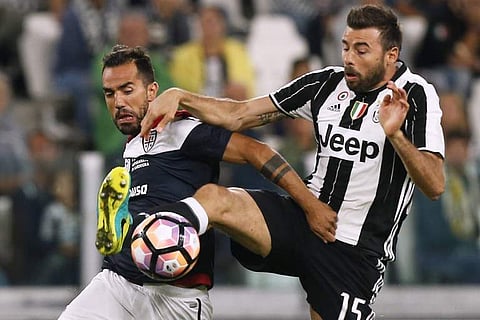 Juventus veteran defender Andrea Barzagli (R) warned his teammates not to underestimate Monaco (File | AFP)