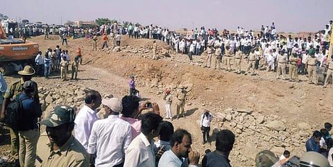 The rescue teams dug 22 borewells to create a tunnel to reach Kaveri; their efforts were delayed as Kaveri slipped 2 ft further down in the borewell  | Express