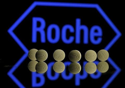 Roche tablets are seen positioned in front of a displayed Roche logo in this picture illustration, January 22, 2016. (File | Reuters)