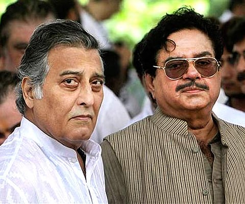 Bollywood actors Vinod Khanna, left, and Shatrughan Sinha. (AP Photo/Rajanish Kakade).