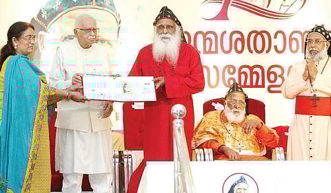Senior BJP leader and former Deputy Prime Minister L K Advani releasing the special stamp cover during the centenary birth celebrations of Philipose Mar Chrysostom Mar Thoma Valiya Metropolitan at Tiruvalla on Thursday | SHAJI VETTIPURAM