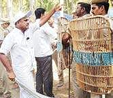 A BJP cadre engaging in a verbal quarrel with police at Keezhadi excavation site on Friday | K K Sundar