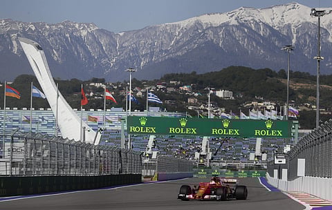 Ferrari driver Sebastian Vettel of Germany steers his car during the second free practice session ahead the Formula One Russian Grand Prix at the 'Sochi Autodrom' circuit, in Sochi, Russia, Friday, April. 28, 2017. | AP