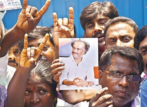 Fans of Rajinikanth outside Raghavendra Kalayana Mandapam in Kodambakkam, where district office bearers of the actor’s fans association met | Ashwin Prasath