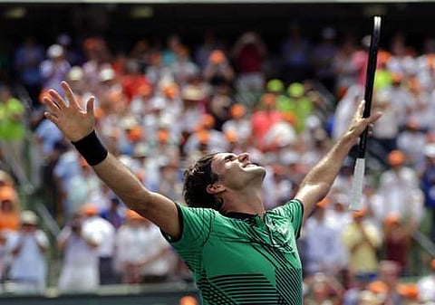 Roger Federer, of Switzerland, celebrates after defeating Rafael Nadal | AP