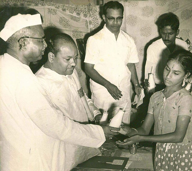 During the two Janata Party governments, he accepted the post of Minister of Defense (1977-79). (Jagjivan Ram, Deputy Prime Minister distributing aids to the poor with DMK minister K A Mathiazhagan on his left |Express photo)