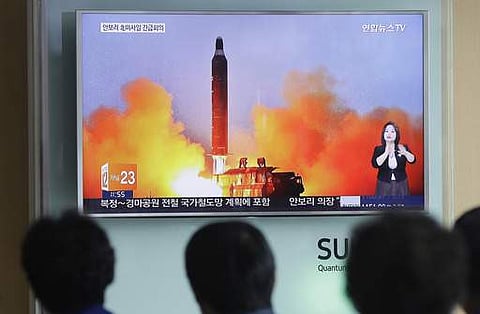 In this June 23, 2016, file photo, people watch a TV news channel airing an image of North Korea's ballistic missile launch.(File | AP)