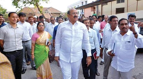 Health minister Kamineni Srinivasa Rao visits the site allotted for the 100- bed hospital proposed on Govt Victoria Hospital campus, in Vizag on Tuesday | Express