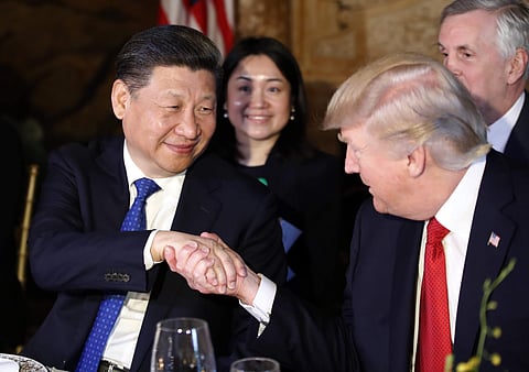 Chinese President Xi Jingping shakes hands with US president Donald Trump. (Photo | AP)
