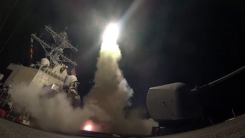 In this image provided by the U.S. Navy, the guided-missile destroyer USS Porter (DDG 78) launches a tomahawk land attack missile in the Mediterranean Sea. (Photo | AP)