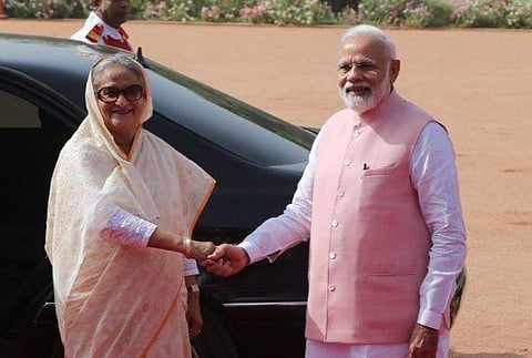 Prime Minister Narendra Modi with Bangladesh Prime Minister Sheikh Hasina during a ceremonial reception at Presidential house in New Delhi on saturday. | (Shekhar Yadav | EPS)