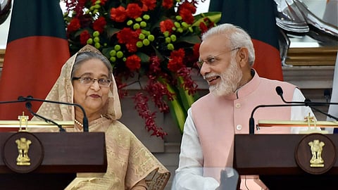Prime Minister Narendra Modi interacting with his Bangladeshi counterpart Sheikh Hasina during a joint press conference at Hyderabad house in New Delhi on Saturday. | PTI