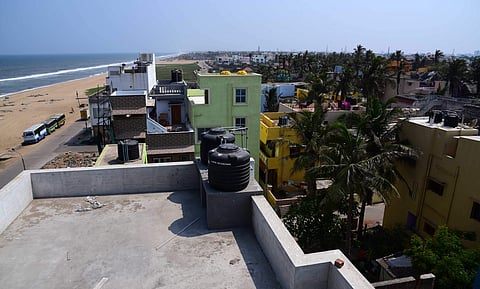 A stretch of beach on the East Coast Road, with buildings creeping towards the shoreline  | Suneesh P Surendran