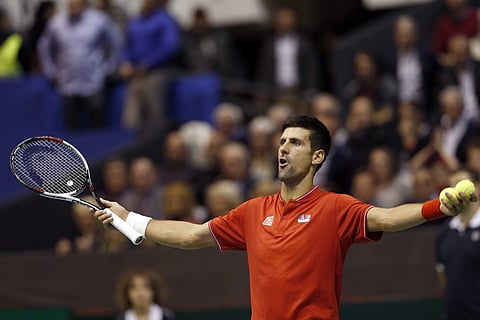 Serbia's Novak Djokovic reacts during their Davis Cup quarterfinal tennis match against Spain's Albert Ramos-Vinolas, in Belgrade, Serbia, Friday, April 7, 2017. | AP