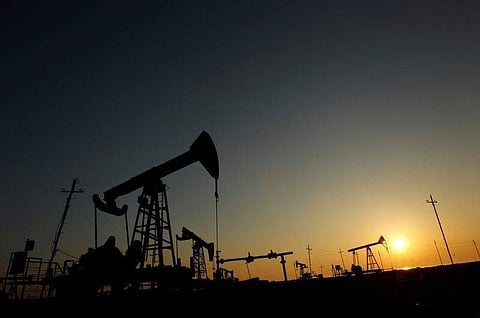 Pump jacks are silhouetted against the rising sun at an oilfield in Baku, Azerbaijan, January 24, 2013. (File|Reuters)