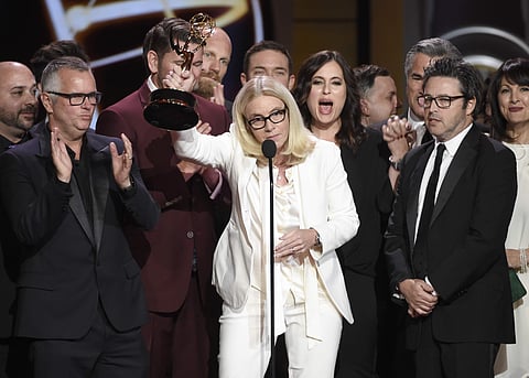 Mary Connelly, center, accepts the award for outstanding entertainment talk show for 'The Ellen DeGeneres Show' at the 44th annual Daytime Emmy Awards at the Pasadena Civic Center on Sunday, April 30, 2017. (File|AP)