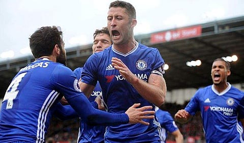 Chelsea defender Gary Cahill (C) | AP