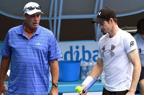 Andy Murray of Great Britain (R) talks to coach Ivan Lendl (L) during a practice session. (File | AFP)