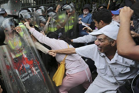 Venezuela's nearly six-week long protest against the embattled government under President Nicolas Maduro and his efforts to rewrite the constitution saw increased support from unexpected corners, as elderly citizens frustrated with medical shortages and the prevailing economic crisis in the country took to the streets on Friday demanding elections. (Photo | AP)