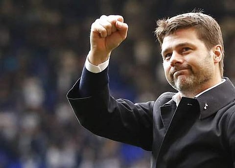 Tottenham's manager Mauricio Pochettino waves to fans as he walks around White Hart Lane during a final ceremony on the pitch after the last match played at the ground. | AP