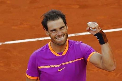 Spain's Rafael Nadal celebrates winning the final of the Madrid Open tennis tournament in two sets, 7-6 (10-8), 6-4, in Madrid. | AP