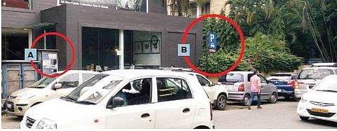 The businessman’s car (A) was parked near the parking space board (B) on St Marks Road.(Below)Grab from the video | express