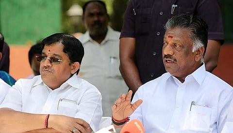 AIADMK leader and former Tamil Nadu CM O. Panneerselvam, right, addressing a press conference in New Delhi on May 19. (Photo | EPS/Shekhar Yadav)
