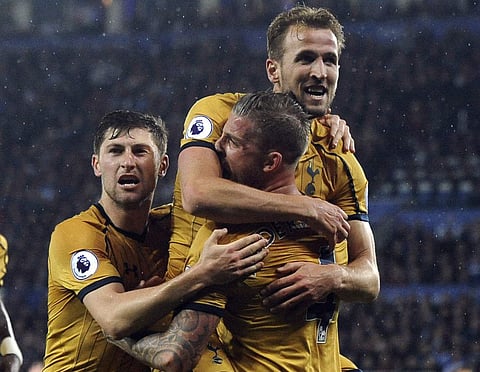 Tottenham's Harry Kane, top, celebrates scoring his second goal during the English Premier League soccer match between Leicester City and Tottenham Hotspur at the King Power Stadium in Leicester, England, Thursday, May 18, 2017.  | AP