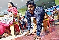 A differently- abled person arriving to present his profile at a ‘Free Swayamvaram, for Disabled’, organised by Chennai Sai Thunai Matrimonial on Sunday | p jawahar