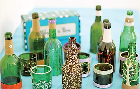 Decorated glass bottles and lamps