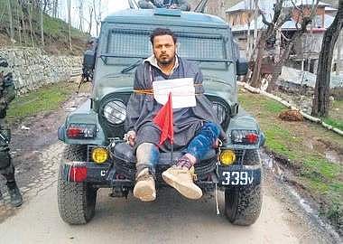 Major Leetul Gogoi (inset) had tied Farooq Dar to his jeep to ward off stone pelters in Kashmir