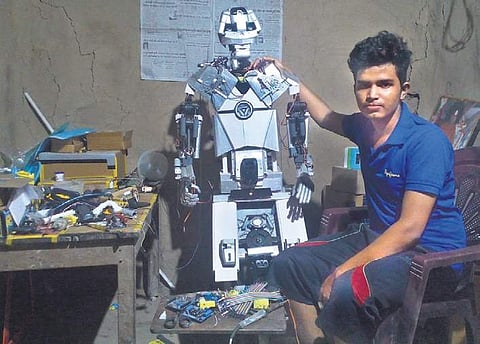 Neelamadhab Behera with his humanoid robot