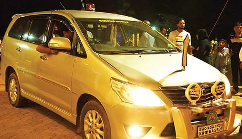 Minister for Food and Civil Supplies U T Khader’s MUV sporting the red beacon