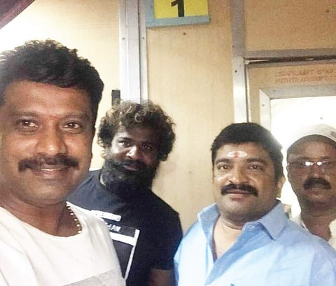 Prem taking a selfie in a train.