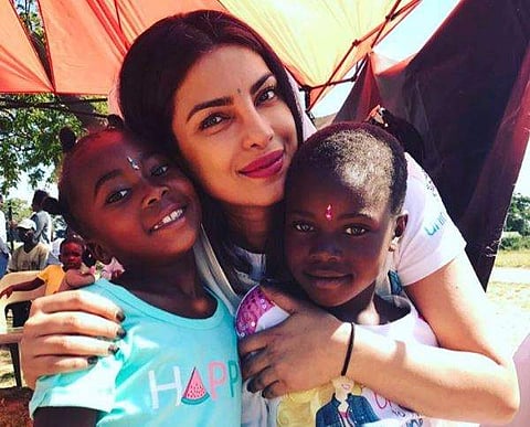 Actor Priyanka Chopra with children who are survivors of sexual violence in Harare. (Photo|Instagram)