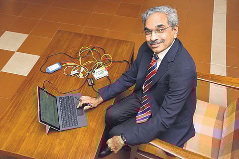 Dr Ramanan with the device | Sunish P Surendran