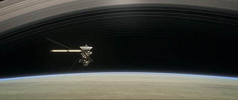 This image made available by NASA in April 2017 shows a still from the short film 'Cassini's Grand Finale,' with the spacecraft diving between Saturn and the planet's innermost ring. (File photo | AP)