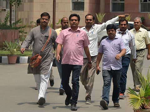 Sacked Delhi Water Minister Kapil Mishra arrives at ACB office to submit evidence in the alleged water tanker scam case to the Anti-Corruption Bureau in New Delhi on Monday. Express photo by Shekhar Yadav