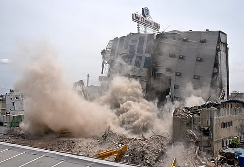 From layers of fine dust that have coated the interiors of several houses in proximity to the building to respiratory problems, residents have even had to temporarily shift out of their homes. | Express Photo Service