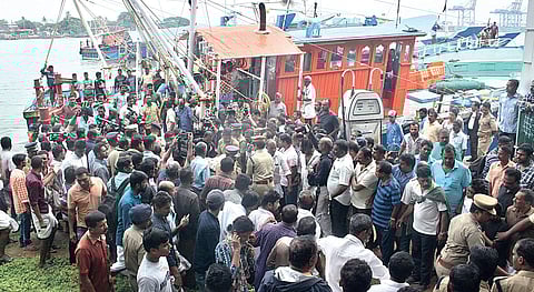 A boat arrives at Fort Kochi with the body of a fisherman who died when Amber L, a Panama-based cargo ship, collided with a fishing boat on Sunday | Melton Antony