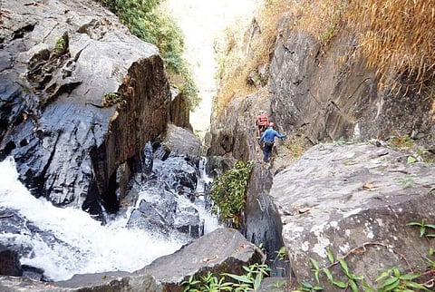 Gokul and Pravin making their way through a canyon
