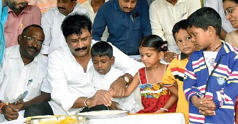 HRD minister Ganta Srinivasa Rao during the launch of Badi Pilustondi programme at Zilla Parishad High School at Yendada in Visakhapatnam on Monday | Express