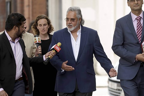 Former Indian politician and billionaire businessman Vijay Mallya centre arrives for his extradition hearing arrives at Westminster Magistrates Court in London Tuesday June 13 2017.  | AP
