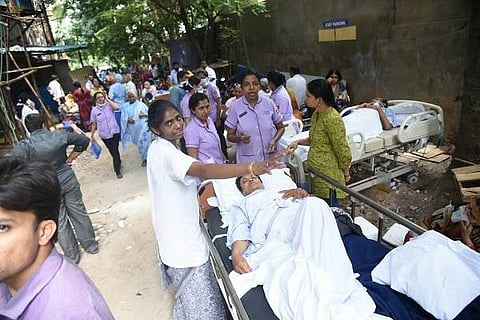 Patients were moved outside Manipal Hospital in Bengaluru after a fire. (Photo | EPS/VinodKumar T)