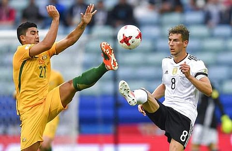 Germany's Leon Goretzka, right, and Australia's Massimo Luongo go for the ball during the Confederations Cup, Group B soccer match between Australia and Germany, at the Fisht Stadium in Sochi. | AP