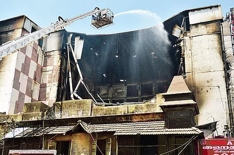 Fire tenders at work near T Nagar’s Chennai Silks building on Thursday, a day after a fire broke out in it | D SAMPATHKUMAR