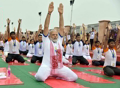 The third International Yoga Day kick-started in India as early as 2 a.m. with thousands across states carrying their mats to participate in mass movement led not by yoga gurus, but by their respective State Governors and Chief Ministers themselves. PM Na