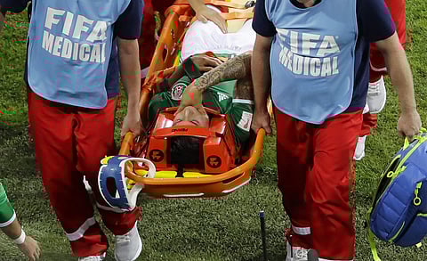 Mexico's Carlos Salcedo is carried off on a stretcher during during the Confederations Cup, Group A soccer match between Mexico and New Zealand, at the Fisht Stadium in Sochi. | ap