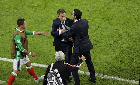 Mexico coach Juan Carlos Osorio, center, reacts during the Confederations Cup, Group A soccer match between Mexico and New Zealand, at the Fisht Stadium in Sochi. | AP